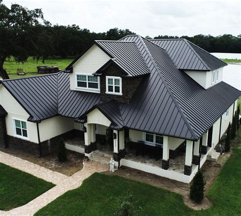 house with black metal roof|black metal roofing problems.